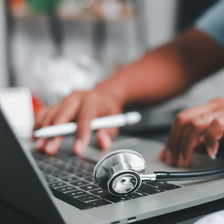 Stock image of a medical researcher using a laptop